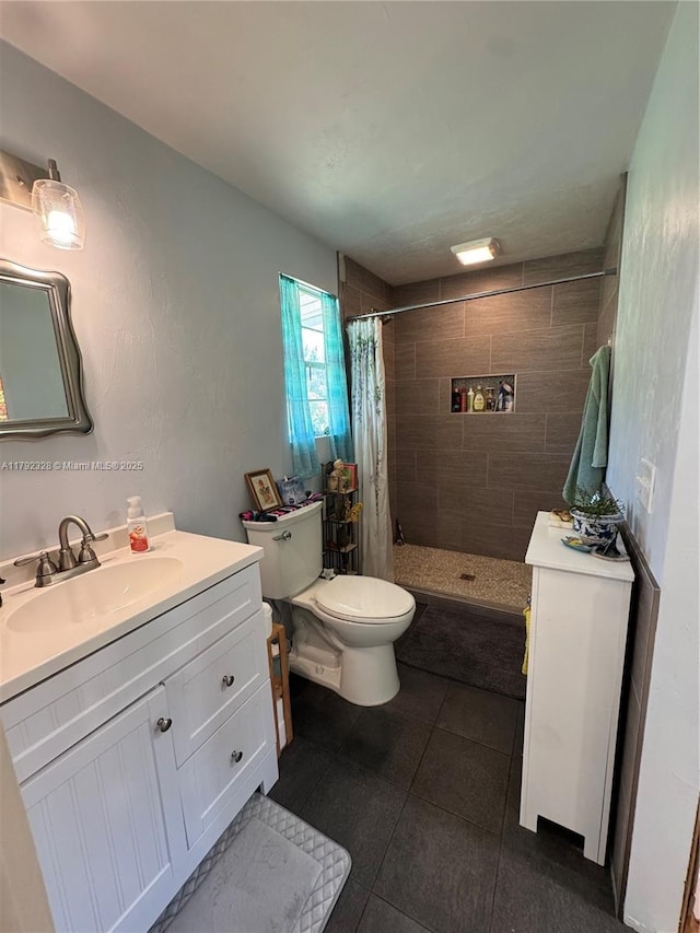 3725 SW 162nd St, Gainesville, FL 32618 - full bathroom featuring tiled shower, vanity, toilet, and tile patterned flooring