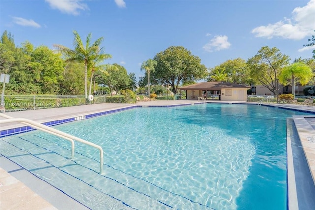 community pool with fence