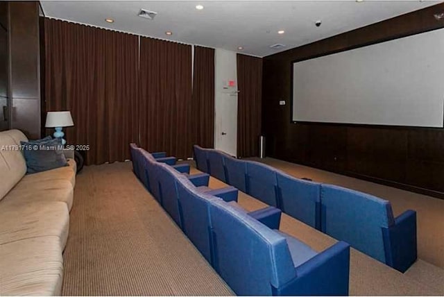 home theater room featuring visible vents, recessed lighting, and light carpet