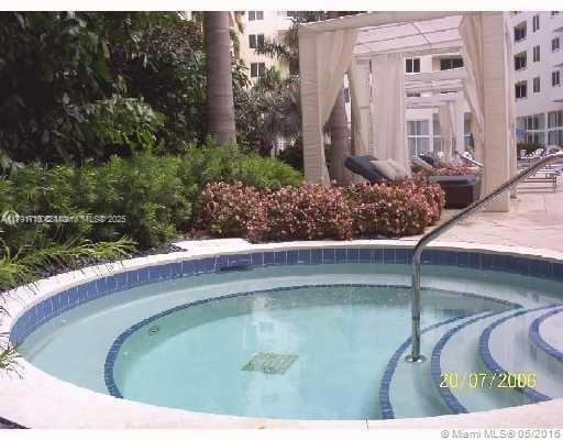 2775 NE 187th St Unit 311, Aventura, FL 33180 - view of swimming pool with a community hot tub and a swimming pool