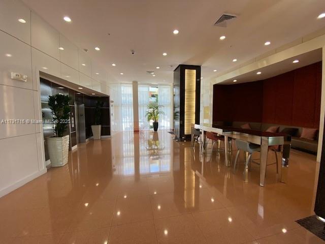 lobby featuring visible vents