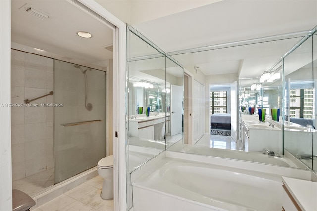 full bathroom featuring vanity, connected bathroom, and a shower stall