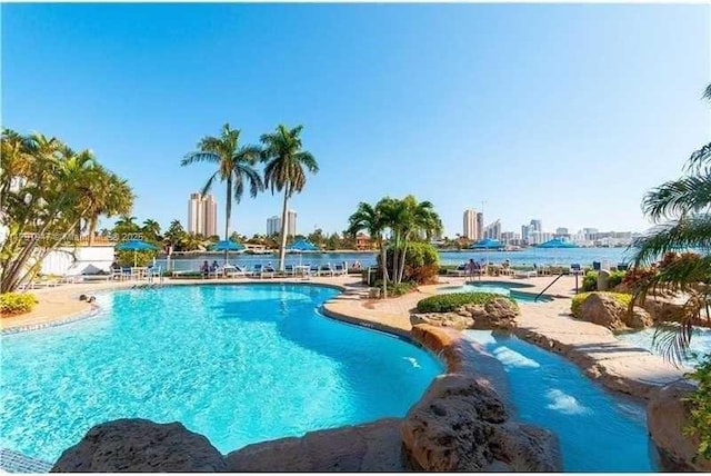 community pool with a view of city