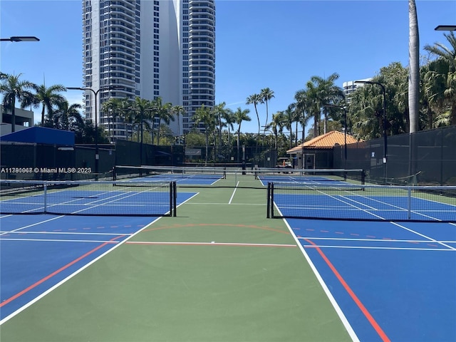 view of sport court with fence and community basketball court