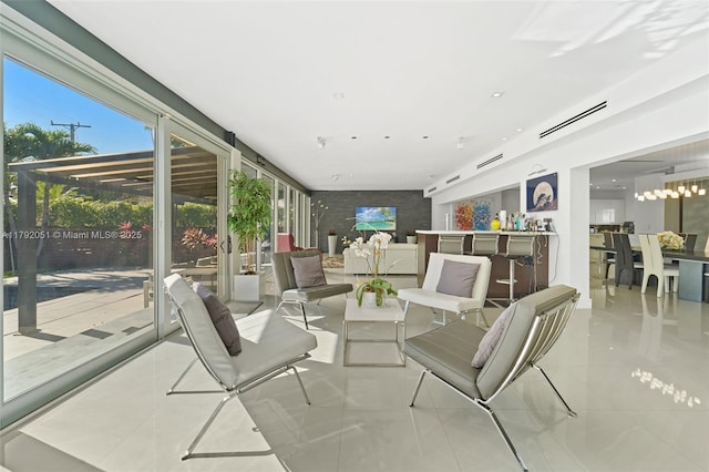 sunroom featuring visible vents