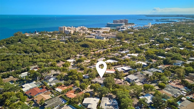 bird's eye view featuring a residential view and a water view