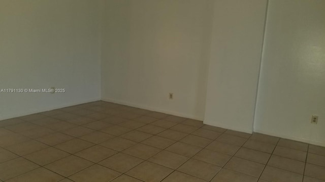 8240 SW 210th St Unit 313, Cutler Bay, FL 33189 - spare room featuring light tile patterned floors