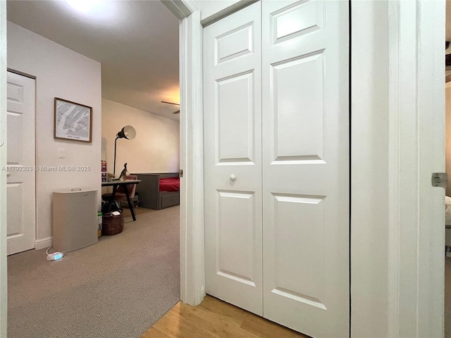 888 S Douglas Rd Unit 119, Coral Gables, FL 33134 - hallway featuring light wood finished floors