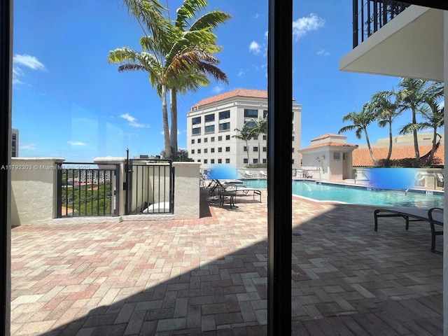 888 S Douglas Rd Unit 119, Coral Gables, FL 33134 - pool with a patio area