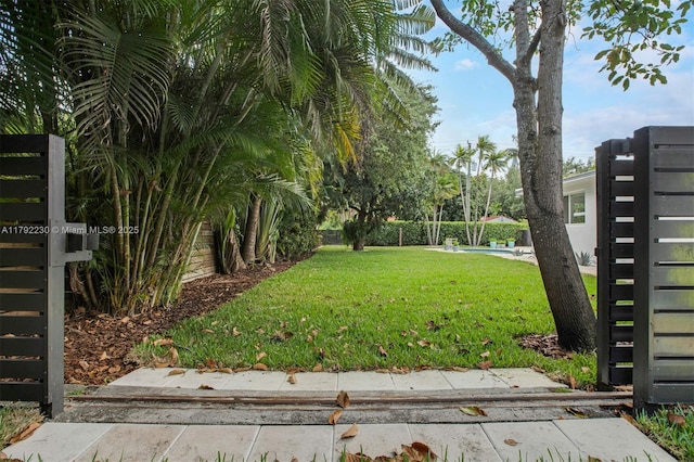 view of yard with fence