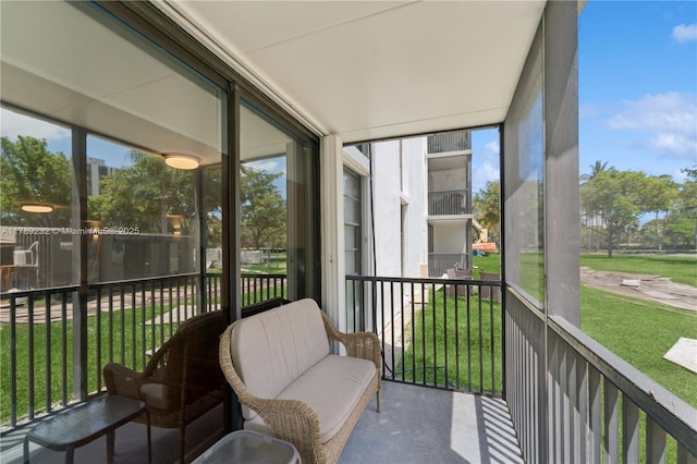 sunroom / solarium with a wealth of natural light