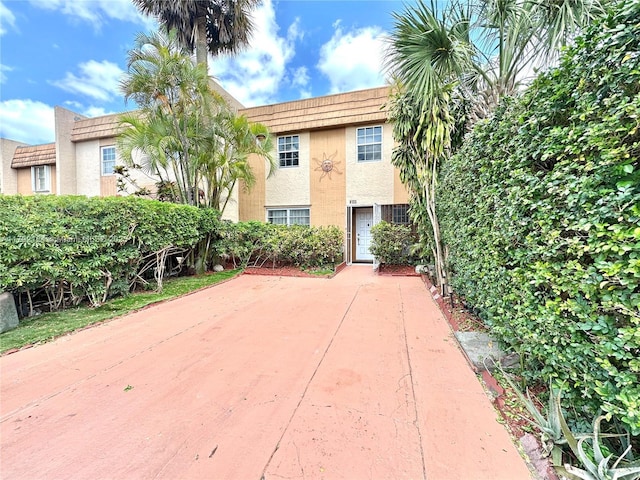8135 W 9th Ave, Hialeah, FL 33014 - view of front facade with a patio and stucco siding
