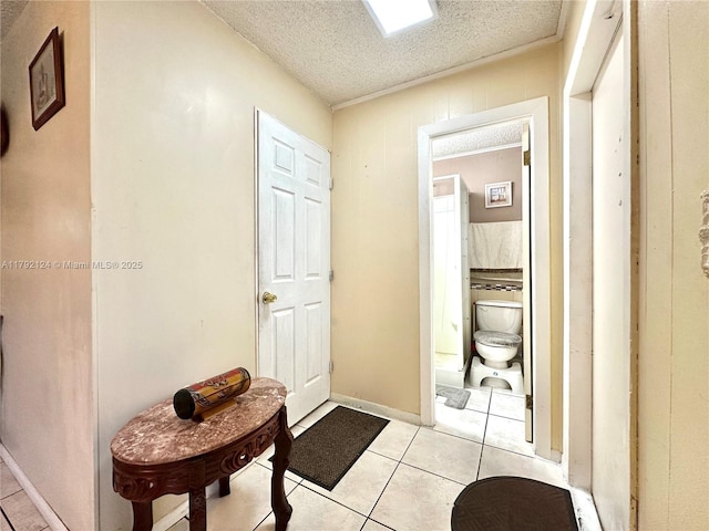8135 W 9th Ave, Hialeah, FL 33014 - interior space with light tile patterned flooring and a textured ceiling