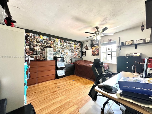 8135 W 9th Ave, Hialeah, FL 33014 - office area with light wood finished floors, a ceiling fan, and a textured ceiling
