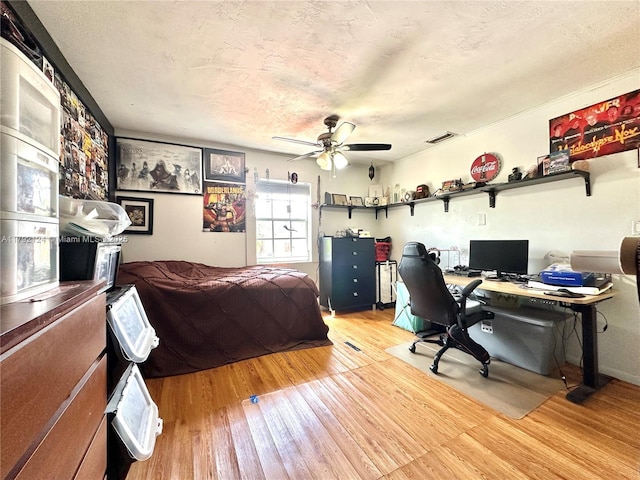8135 W 9th Ave, Hialeah, FL 33014 - bedroom featuring wood finished floors, ceiling fan, and visible vents