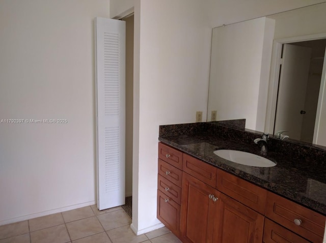 11229 W Atlantic Blvd Unit 204, Coral Springs, FL 33071 - bathroom with tile patterned floors, vanity, and a closet