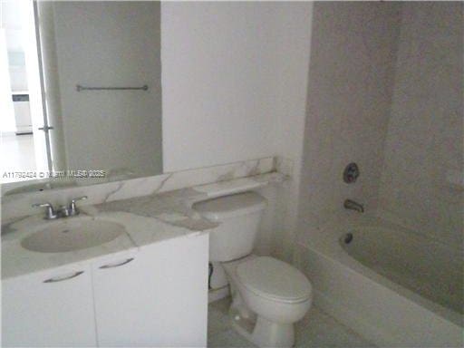 234 NE 3rd St Unit 1208, Miami, FL 33132 - full bath with vanity, toilet, and shower / washtub combination