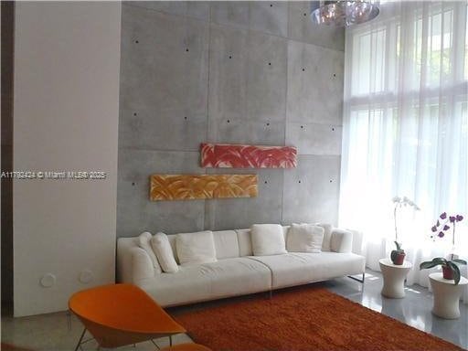 234 NE 3rd St Unit 1208, Miami, FL 33132 - living area featuring a chandelier