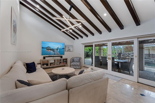 living room with a chandelier, beam ceiling, recessed lighting, french doors, and high vaulted ceiling