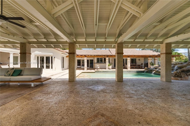pool featuring french doors and a patio area