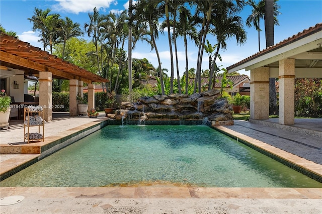 outdoor pool with a patio