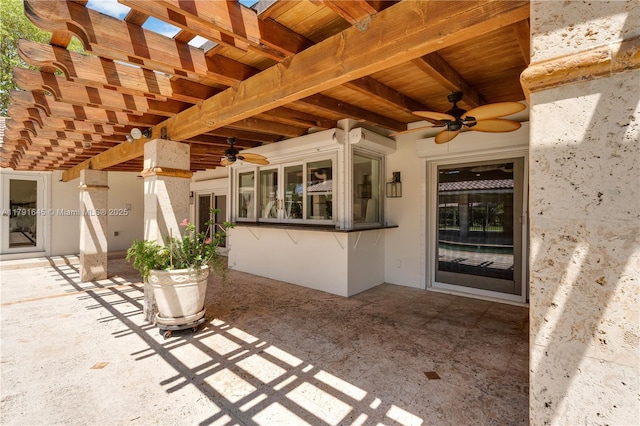 view of patio with ceiling fan