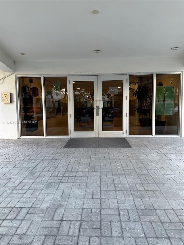 1750 James Ave Unit 10A, Miami Beach, FL 33139 - view of patio featuring french doors