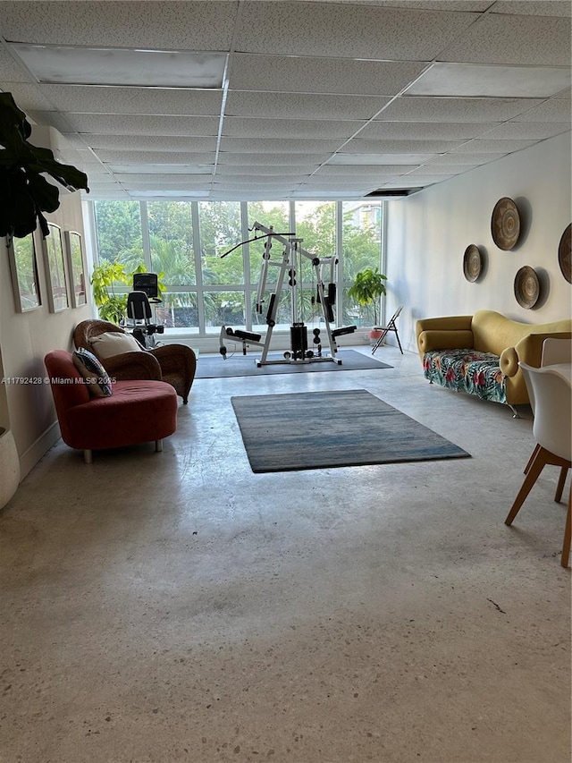 exercise area featuring a paneled ceiling