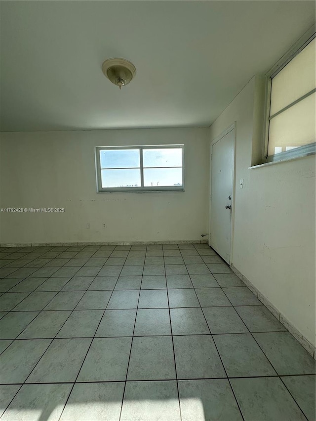 1750 James Ave Unit 10A, Miami Beach, FL 33139 - spare room with light tile patterned floors