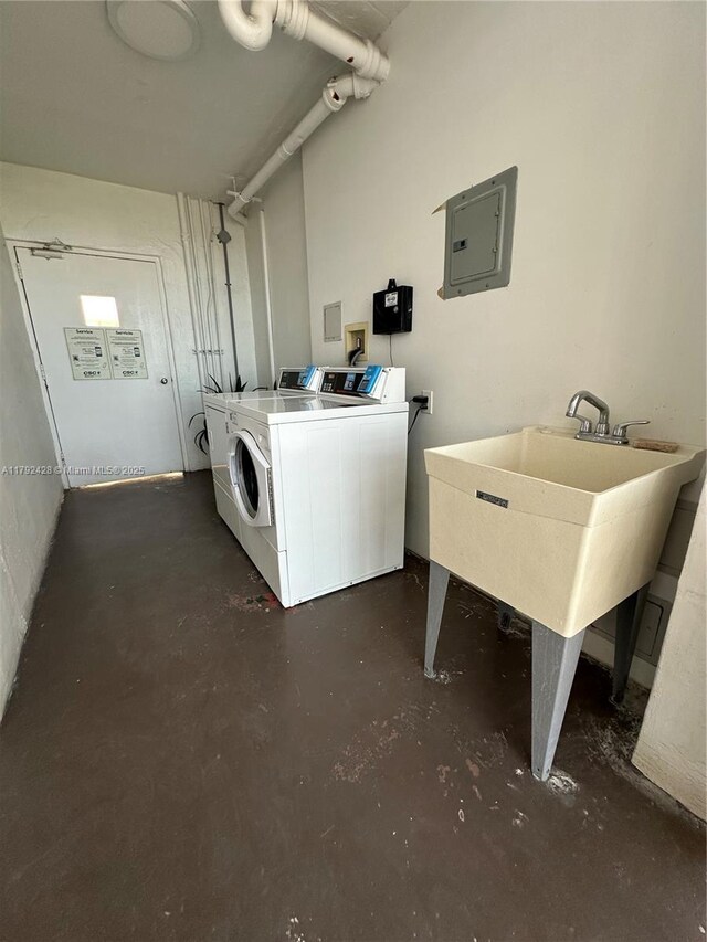 laundry area featuring separate washer and dryer and electric panel