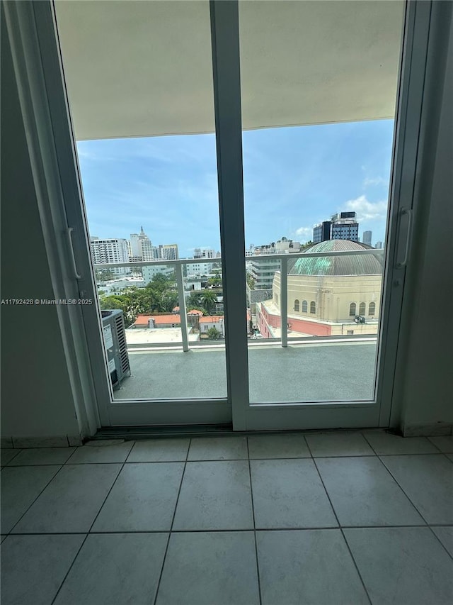 1750 James Ave Unit 10A, Miami Beach, FL 33139 - doorway featuring a view of city and tile patterned floors