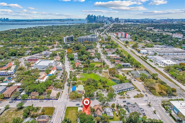 bird's eye view with a view of city and a water view