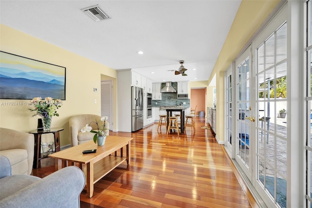 4701 Garfield St, Hollywood, FL 33021 - living area featuring recessed lighting, ceiling fan, light wood-type flooring, visible vents, and french doors