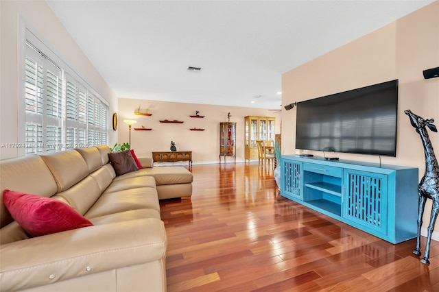 4701 Garfield St, Hollywood, FL 33021 - living room featuring wood finished floors, plenty of natural light, recessed lighting, and baseboards