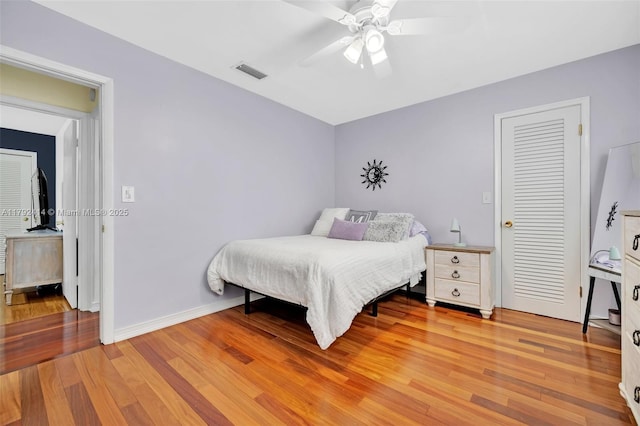 4701 Garfield St, Hollywood, FL 33021 - bedroom with visible vents, ceiling fan, wood finished floors, and baseboards