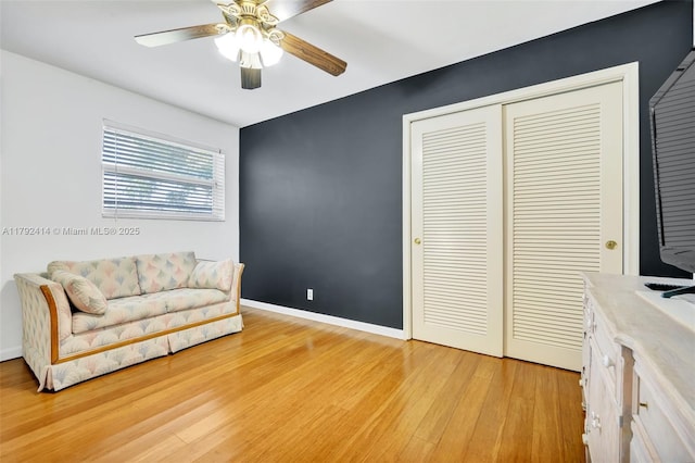 4701 Garfield St, Hollywood, FL 33021 - sitting room with baseboards, ceiling fan, and light wood-style flooring