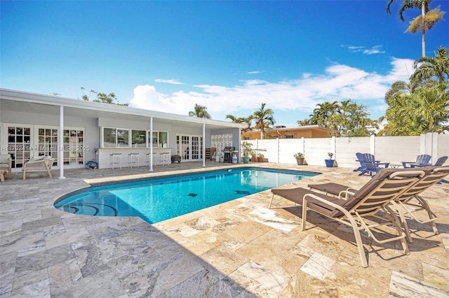 4701 Garfield St, Hollywood, FL 33021 - view of pool featuring fence, a patio area, french doors, and a fenced in pool