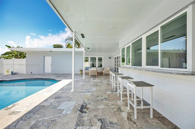 4701 Garfield St, Hollywood, FL 33021 - view of swimming pool featuring a fenced in pool, fence, a patio, and an outdoor hangout area