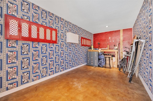 4701 Garfield St, Hollywood, FL 33021 - misc room with concrete floors, recessed lighting, wallpapered walls, and baseboards