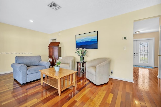 4701 Garfield St, Hollywood, FL 33021 - living area with recessed lighting, visible vents, baseboards, and light wood-type flooring
