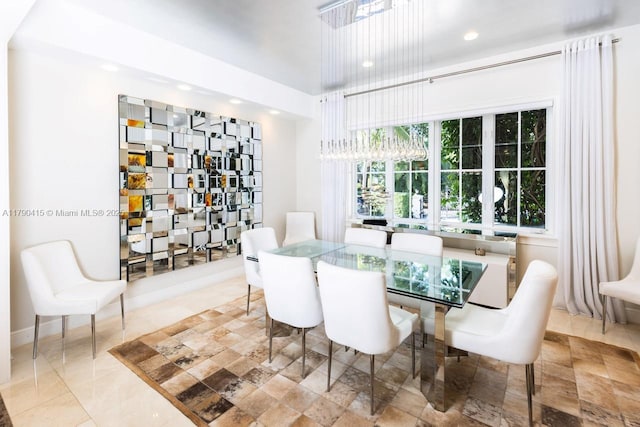 dining space with recessed lighting