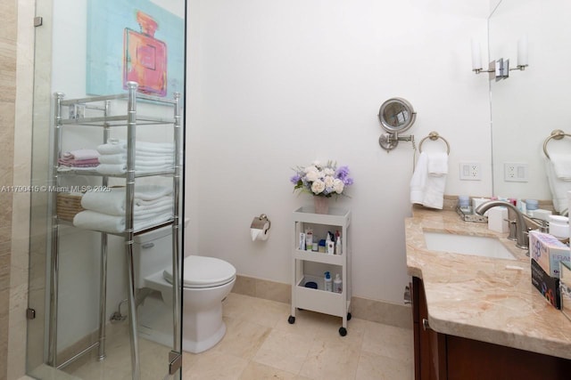 full bath featuring a shower stall, toilet, tile patterned flooring, and vanity