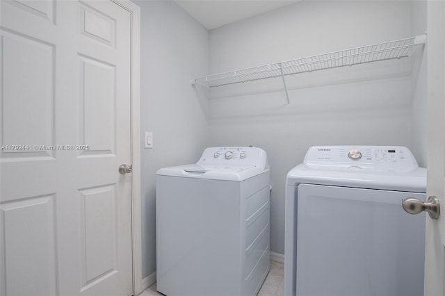 1808 NE 7th Ave, Cape Coral, FL 33909 - clothes washing area featuring washing machine and clothes dryer and laundry area