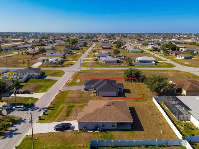 1808 NE 7th Ave, Cape Coral, FL 33909 - drone / aerial view featuring a residential view