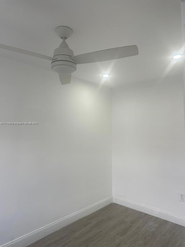 12025 SW 10th St Unit 204, Miami, FL 33184 - empty room with dark wood finished floors and baseboards