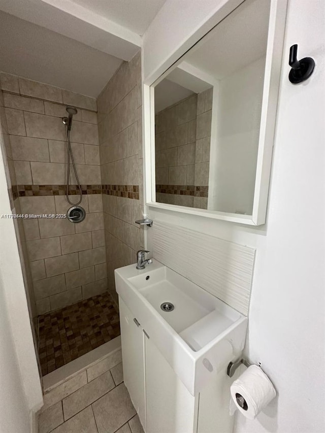 12025 SW 10th St Unit 204, Miami, FL 33184 - bathroom featuring tile patterned floors, a stall shower, and vanity