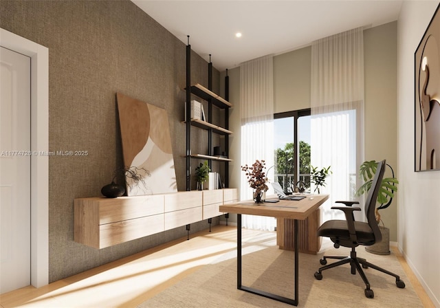 office space with baseboards and recessed lighting