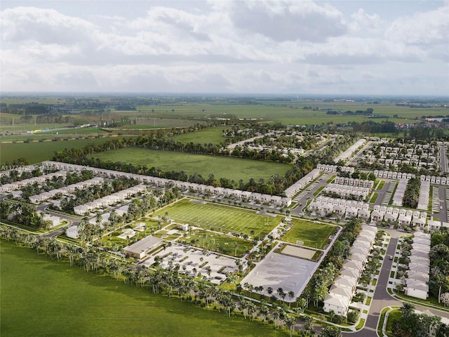 birds eye view of property featuring a rural view