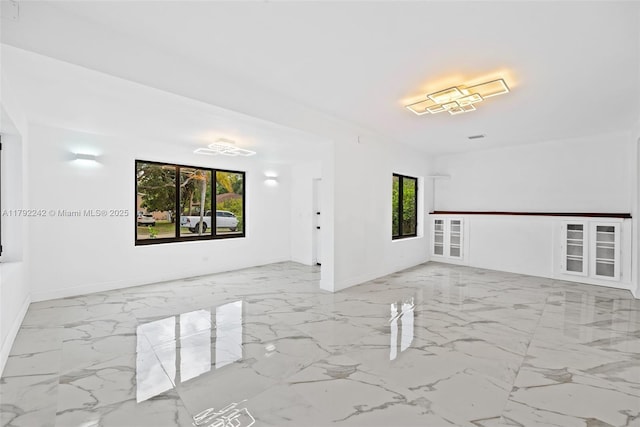 1683 NE 168th St, North Miami Beach, FL 33162 - unfurnished room with marble finish floor and baseboards
