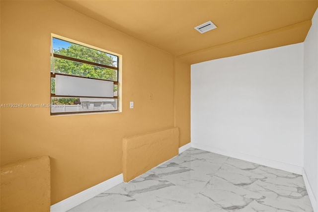 1683 NE 168th St, North Miami Beach, FL 33162 - interior space with baseboards, visible vents, and marble finish floor